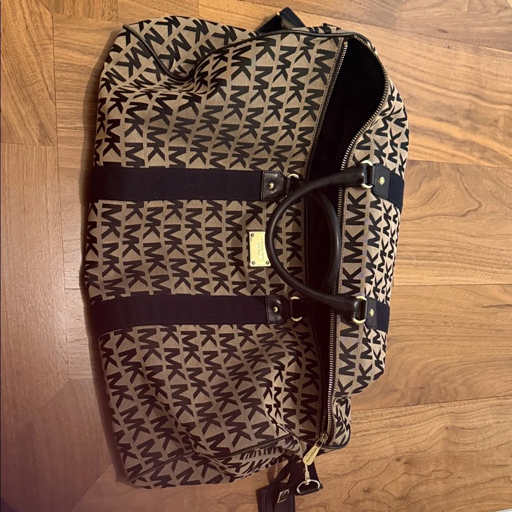 Michael Kors Monogram Black and Tan Duffel Bag - Picture 2 of 3